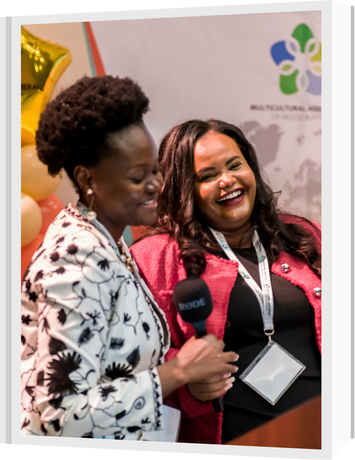 Image of MCA Board President, Dango Gogo, and MCA Executive Director, Muna Ali, presenting at MCA's Annual General Meeting